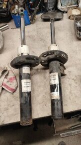 Predni tlumice tiguan 2010