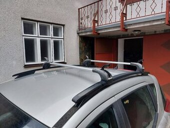 Originál příčníky / střešní nosič pro Peugeot 207 SW