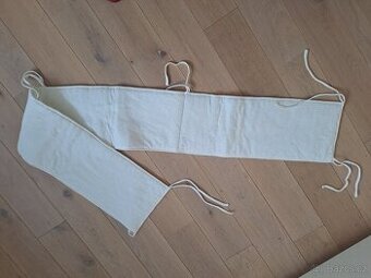 ochranný mantinel do dětské postýlky bílý