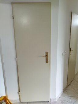 Plné interiérové dveře včetně kliky