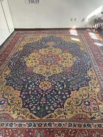 Perský vlněný starodávný koberec