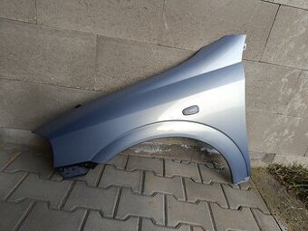 Prodám levý přední blatník na Opel astre g