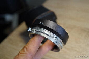 Canon LTM 50/1.4 příslušenství - sluneční clona, velmi hezká