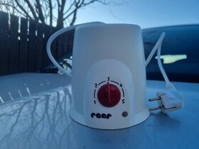 Ohřívač kojeneckých lahví REER