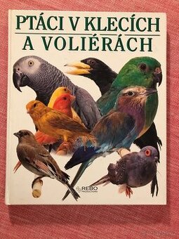 Ptáci v klecích a voliérách.