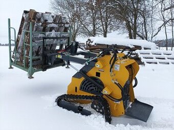 Pásový smykový nakladač