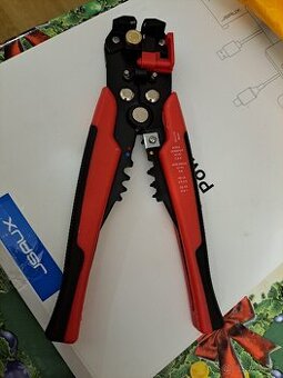Elektrikářské kleště na oholování kabelů