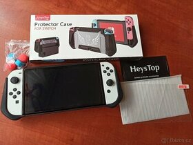 Držák-grip + ochranné sklo Nintendo Switch