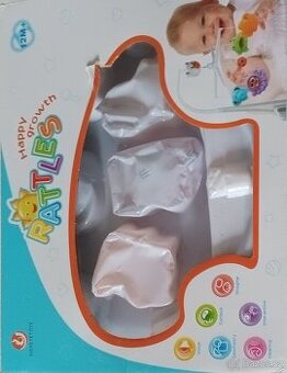 Mechanický kolotoč nad postýlku