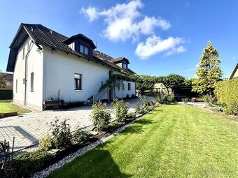 Prodej vícegeneračního domu (užitná plocha 414 m²) s garáží 
