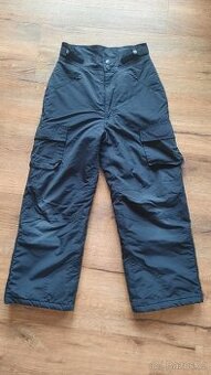 Vyleteplené kalhoty Okay vel.128.