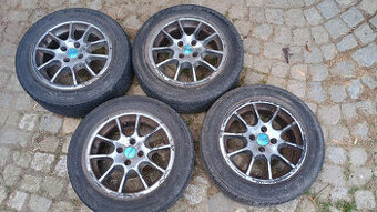 Alu kola Dezent 4x100 s pneu 195/60 R15 (#179)