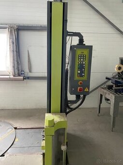 Stroj na ovinování palet