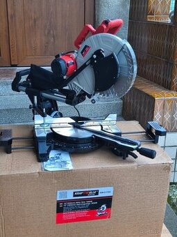 Prodám VELKOU NEPOUŽITOU pokosovou pilu s posuvem KRAFTWELLE