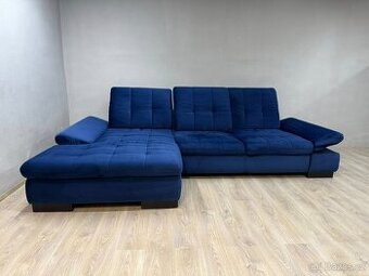 Tm. modrá sedací souprava.