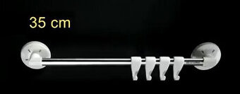 Nová kuchyňská závěsná lišta Tescoma s přísavkami a háčky