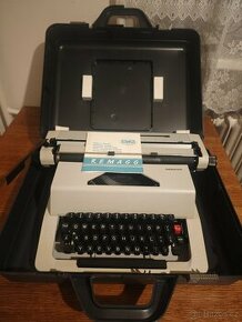 Kufříkový psací stroj REMAGG