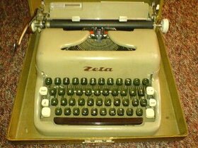 Kufříkový psací stro