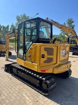 Strojník Minibagrů nebo Unc -bobek Caterpillar - 1