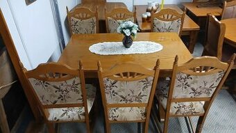 Masivní rozkládací stůl + 6 ks masivních židlí