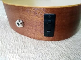 Predam el-ak. ukulele LAG TKU150TE za cenu elektroniky.