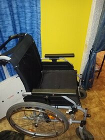 Mechanicky invalidní vozík