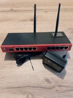 MikroTik RB2011UiAS-2HnD-IN + Tp-link TLCG 105