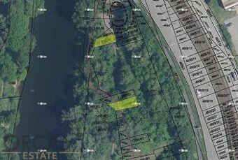 Podíl 42 m2 na pozemcích v k.ú. Komín a v k.ú. Bystrc