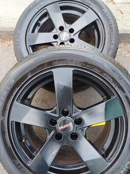 5x100 R16 6,5j et 38 Dezent cerne