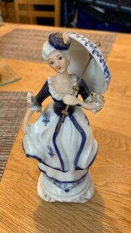 Porcelanova figurka Panenka s destnikem