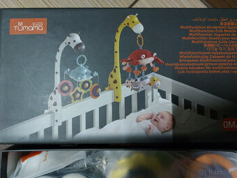 Kolotoč nad postýlku Tumama