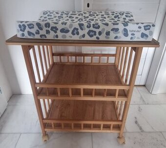 Prebalovaci pult vc. kolecek