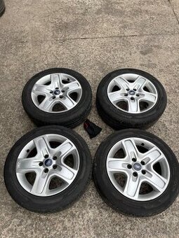 Plechová letni kola s poklicemi Ford 5x108