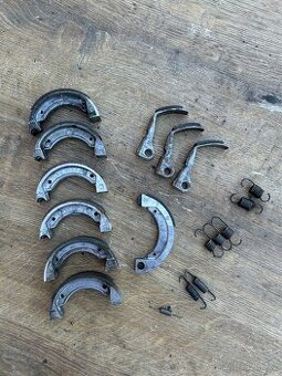 Brzdové + spojkové čelisti a pružiny