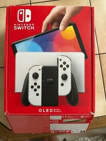 Nintendo Switch OLED + 2 hry