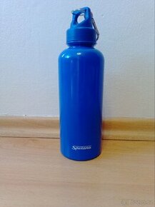 Plastová láhev s nápisem Spolana (nepoužité)