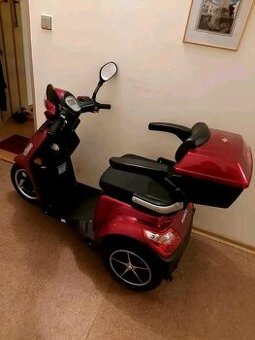 Elektrická tříkolka.