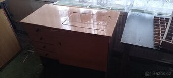 Šicí stroj za odvoz