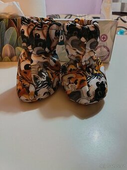 Softshellové capáčky