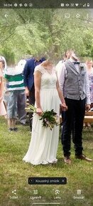Svatební šaty s odhalenými zády