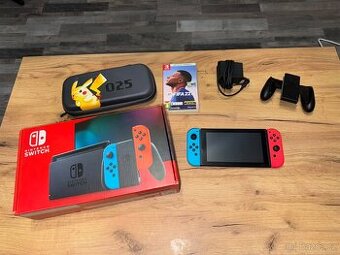 Nintendo Switch V2 + příslušenství + hry (Fifa, Hades,Metro)