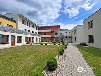 Prodej bytu 2+kk se zahrádkou v obci Lavičky