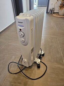 Téměř nepoužívaný olejový radiátor SilverCrest 1500 W bílý