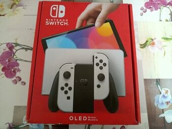 Nintendo Switch OLED + RING FIT ADVENTURE