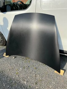 Prodám levně -Kapota Porsche cayenne