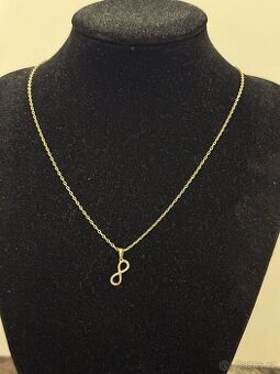 Zlatý řetízek s přívěskem nekonečno 4,16g 585/1000