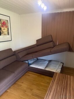 Rozkládací rohová sedačka s úložným prostorem