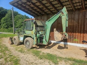 Traktorbagr Kramer 416 S