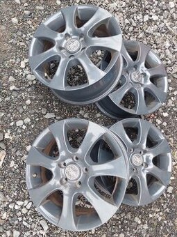 Litá kola na Ford Focus+celoroční gumy na dojezd