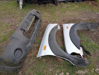 Nissan Navara D22 přední nárazník, blatníky